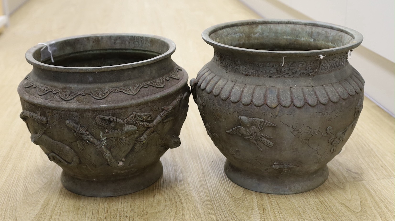 Two Japanese bronze planters, top being 25 cms diameter.